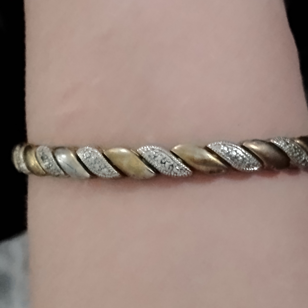 Elegant Gold and Silver Twisted Bracelet